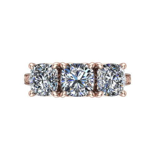 Navy cushion three stone engagement ring in 14K Rose Gold, top-down view showing the trio of cushion stones set in a row