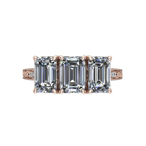 Navy emerald three stone engagement ring in 14K Rose Gold, top-down view showing the trio of emerald stones set in a row