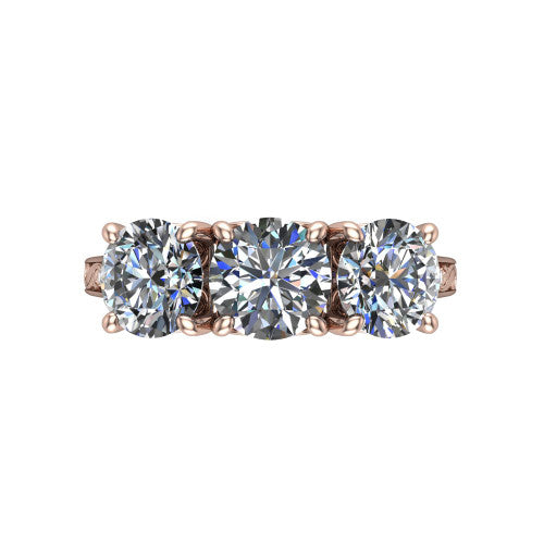 Navy round three stone engagement ring in 18K Rose Gold, top-down view showing the trio of round stones set in a row