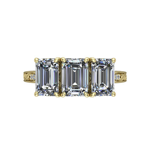 Navy emerald three stone engagement ring in 18K Yellow Gold, top-down view showing the trio of emerald stones set in a row