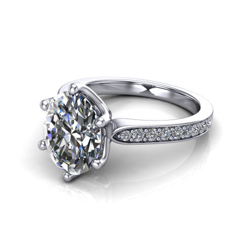Annalise oval classic solitaire engagement ring in Platinum, three-quarter perspective showing the oval center on six prongs above a pav&eacute; band