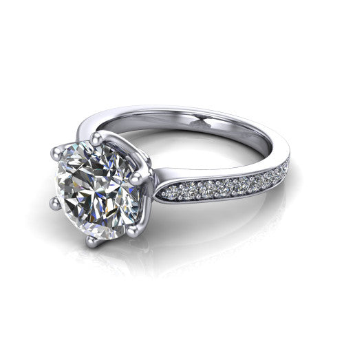 Annalise round classic solitaire engagement ring in Platinum, three-quarter perspective showing the round center on six prongs above a pav&eacute; band