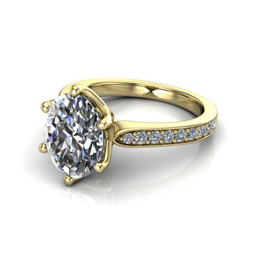 Annalise oval classic solitaire engagement ring in 14K Yellow Gold, three-quarter perspective showing the oval center on six prongs above a pav&eacute; band