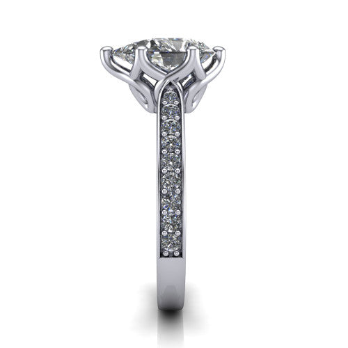 Annalise pear classic solitaire engagement ring in Platinum, side profile showing the pav&eacute; band with milgrain edges and the filigree gallery in profile