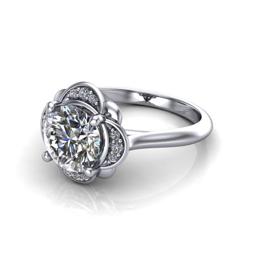 Anaya round hidden halo engagement ring in Platinum, three-quarter perspective showing the round center above a round pav&eacute; under-halo on a plain band
