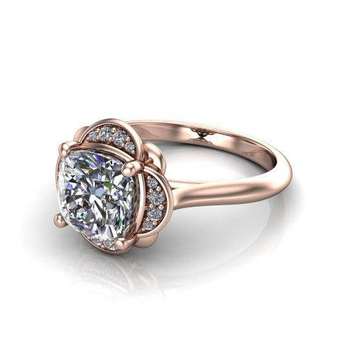 Anaya cushion hidden halo engagement ring in 18K Rose Gold, three-quarter perspective showing the cushion center above a round pav&eacute; under-halo on a plain band