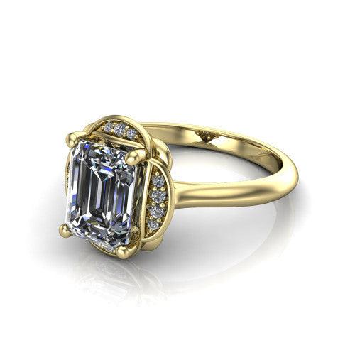Anaya emerald hidden halo engagement ring in 18K Yellow Gold, three-quarter perspective showing the emerald center above a round pav&eacute; under-halo on a plain band