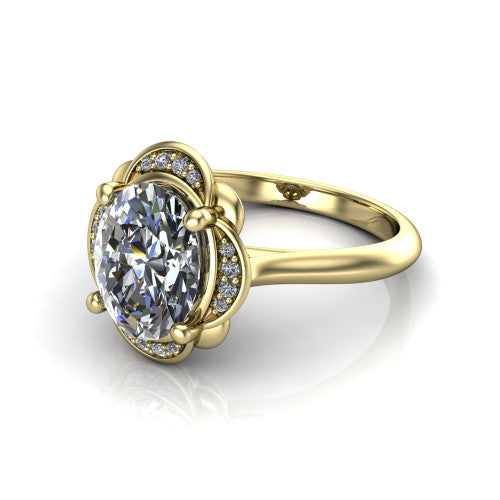 Anaya oval hidden halo engagement ring in 18K Yellow Gold, three-quarter perspective showing the oval center above a round pav&eacute; under-halo on a plain band