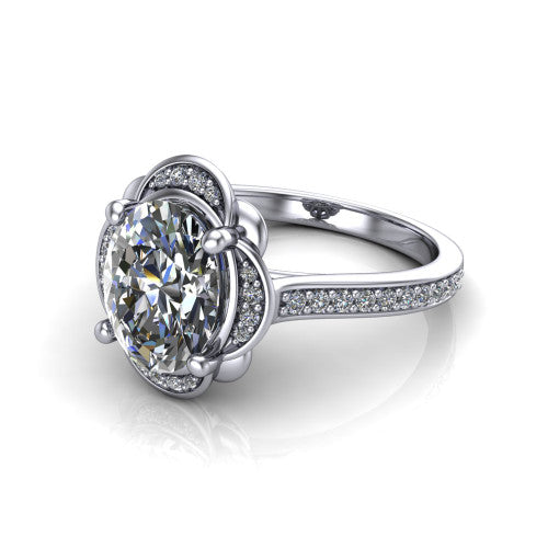 Sabrina oval hidden halo engagement ring in Platinum, three-quarter perspective showing the oval center above a round pav&eacute; under-halo on a pav&eacute; band