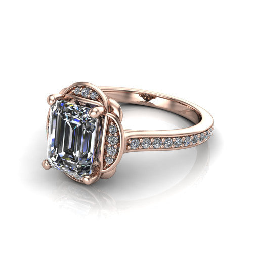 Sabrina emerald hidden halo engagement ring in 18K Rose Gold, three-quarter perspective showing the emerald center above a round pav&eacute; under-halo on a pav&eacute; band