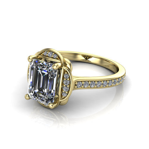 Sabrina emerald hidden halo engagement ring in 18K Yellow Gold, three-quarter perspective showing the emerald center above a round pav&eacute; under-halo on a pav&eacute; band