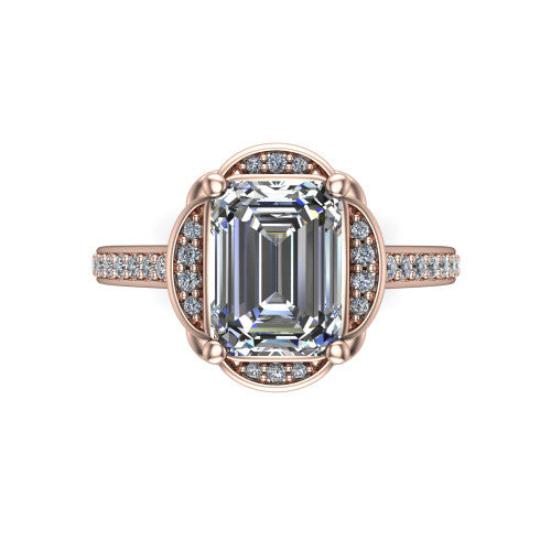 Sabrina emerald hidden halo engagement ring in 14K Rose Gold, top-down view showing the compass prongs and round pav&eacute; halo framing the emerald center
