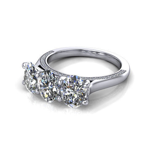 Maryam oval three stone engagement ring in 18K White Gold, three-quarter perspective showing three oval diamonds set side by side above a pav&eacute; band