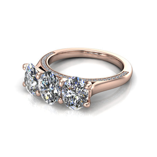 Maryam oval three stone engagement ring in 14K Rose Gold, three-quarter perspective showing three oval diamonds set side by side above a pav&eacute; band