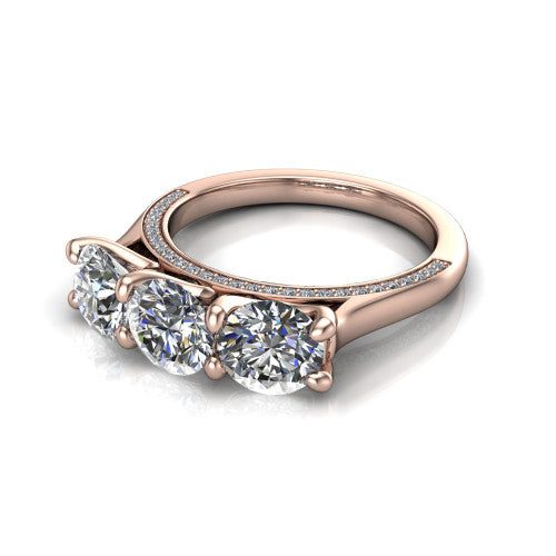 Maryam round three stone engagement ring in 14K Rose Gold, three-quarter perspective showing three round diamonds set side by side above a pav&eacute; band