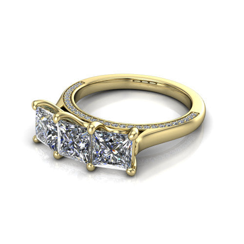 Maryam princess three stone engagement ring in 18K Yellow Gold, three-quarter perspective showing three princess diamonds set side by side above a pav&eacute; band