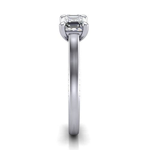 Maryam square emerald three stone engagement ring in 18K White Gold, side profile showing the pav&eacute; band with milgrain edges and the raised three-stone setting