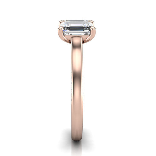 Maryam emerald three stone engagement ring in 18K Rose Gold, side profile showing the pav&eacute; band with milgrain edges and the raised three-stone setting