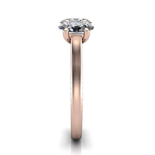 Maryam oval three stone engagement ring in 14K Rose Gold, side profile showing the pav&eacute; band with milgrain edges and the raised three-stone setting