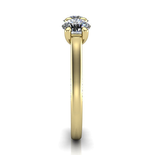 Maryam round three stone engagement ring in 14K Yellow Gold, side profile showing the pav&eacute; band with milgrain edges and the raised three-stone setting