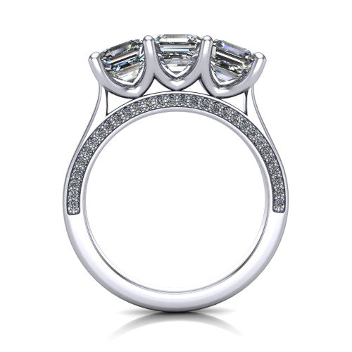 Maryam square emerald three stone engagement ring in 18K White Gold, through-finger front profile showing the three-stone head and diamond-accented gallery above the pav&eacute; band
