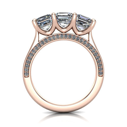 Maryam square emerald three stone engagement ring in 18K Rose Gold, through-finger front profile showing the three-stone head and diamond-accented gallery above the pav&eacute; band