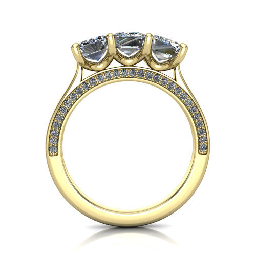 Maryam emerald three stone engagement ring in 14K Yellow Gold, through-finger front profile showing the three-stone head and diamond-accented gallery above the pav&eacute; band