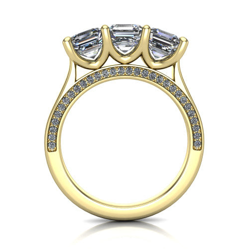 Maryam square emerald three stone engagement ring in 14K Yellow Gold, through-finger front profile showing the three-stone head and diamond-accented gallery above the pav&eacute; band
