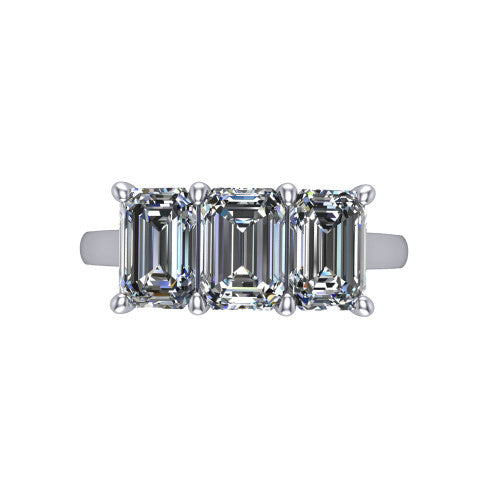 Maryam emerald three stone engagement ring in Platinum, top-down view showing the trio of emerald stones set in a row