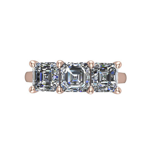 Maryam square emerald three stone engagement ring in 18K Rose Gold, top-down view showing the trio of square emerald stones set in a row