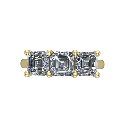 Maryam square emerald three stone engagement ring in 14K Yellow Gold, top-down view showing the trio of square emerald stones set in a row