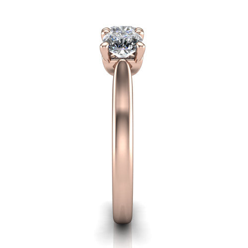 Amora cushion three stone engagement ring in 14K Rose Gold, side profile showing the plain polished band and the raised three-stone setting