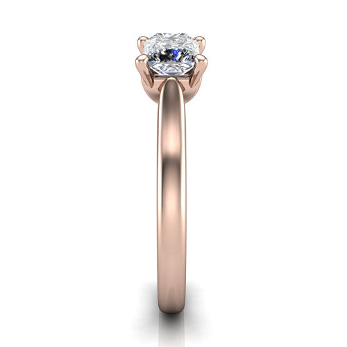 Amora princess three stone engagement ring in 14K Rose Gold, side profile showing the plain polished band and the raised three-stone setting
