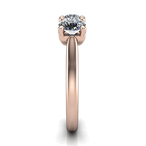 Amora round three stone engagement ring in 14K Rose Gold, side profile showing the plain polished band and the raised three-stone setting