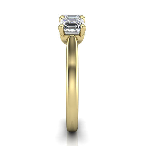 Amora square emerald three stone engagement ring in 14K Yellow Gold, side profile showing the plain polished band and the raised three-stone setting
