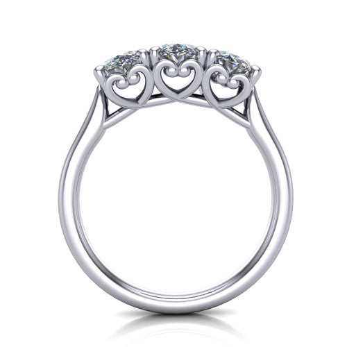 Amora oval three stone engagement ring in 18K White Gold, through-finger side profile showing the heart filigree scroll gallery beneath the three stones
