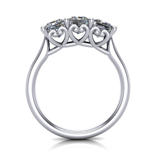 Amora princess three stone engagement ring in Platinum, through-finger side profile showing the heart filigree scroll gallery beneath the three stones