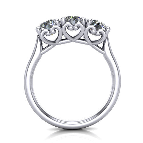 Amora round three stone engagement ring in Platinum, through-finger side profile showing the heart filigree scroll gallery beneath the three stones