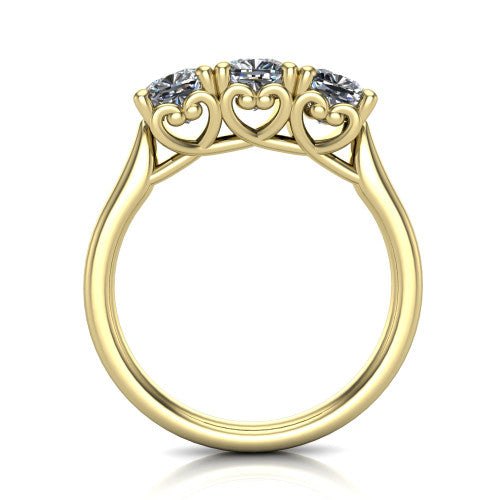 Amora cushion three stone engagement ring in 14K Yellow Gold, through-finger side profile showing the heart filigree scroll gallery beneath the three stones