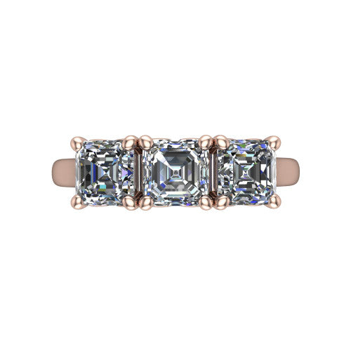 Amora square emerald three stone engagement ring in 18K Rose Gold, top-down view showing the trio of square emerald stones set in a row