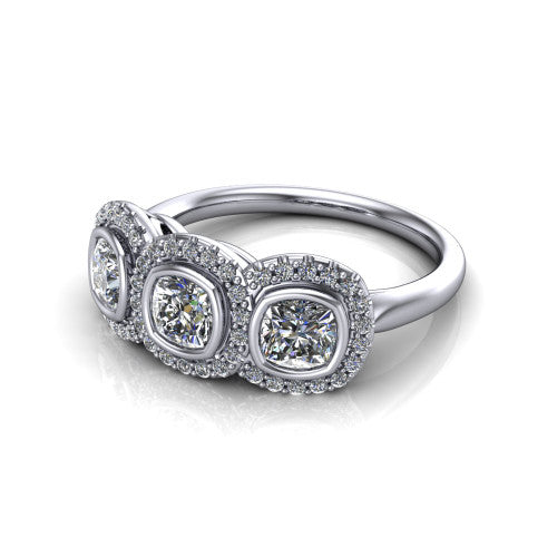 Lorelei cushion three stone halo engagement ring in 14K White Gold, three-quarter perspective showing three cushion stones each in a squared pav&eacute; halo above a plain band