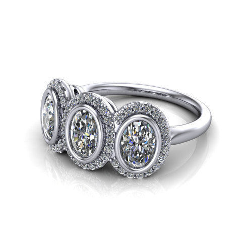 Lorelei oval three stone halo engagement ring in 14K White Gold, three-quarter perspective showing three oval stones each in a squared pav&eacute; halo above a plain band
