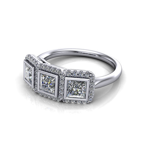 Lorelei princess three stone halo engagement ring in 18K White Gold, three-quarter perspective showing three princess stones each in a squared pav&eacute; halo above a plain band