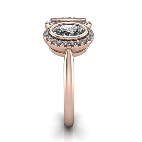 Lorelei oval three stone halo engagement ring in 14K Rose Gold, side profile showing the plain polished band and the three-stone halo in profile