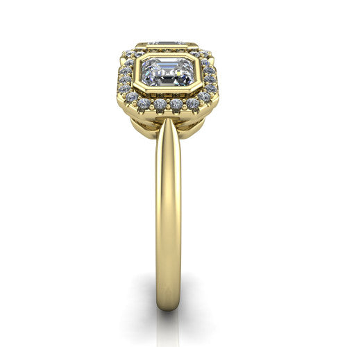 Lorelei square emerald three stone halo engagement ring in 18K Yellow Gold, side profile showing the plain polished band and the three-stone halo in profile