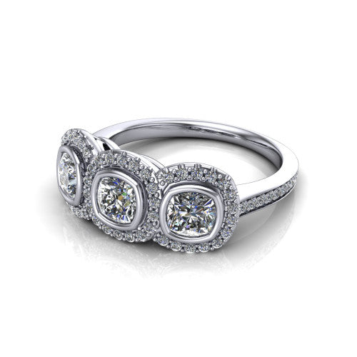 Aviana cushion three stone halo engagement ring in 14K White Gold, three-quarter perspective showing three cushion stones each in a squared pav&eacute; halo above a pav&eacute; band