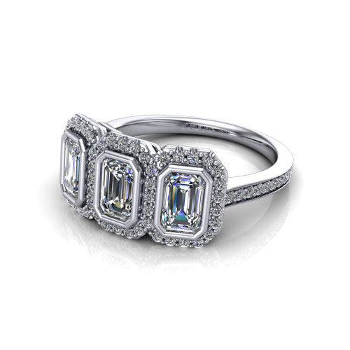Aviana emerald three stone halo engagement ring in 14K White Gold, three-quarter perspective showing three emerald stones each in a squared pav&eacute; halo above a pav&eacute; band