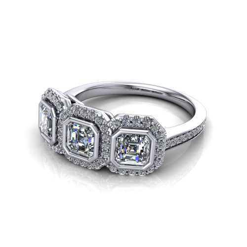 Aviana square emerald three stone halo engagement ring in 14K White Gold, three-quarter perspective showing three square emerald stones each in a squared pav&eacute; halo above a pav&eacute; band