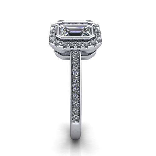Aviana emerald three stone halo engagement ring in 18K White Gold, side profile showing the pav&eacute; band, filigree scrollwork gallery, and three-stone halo in profile