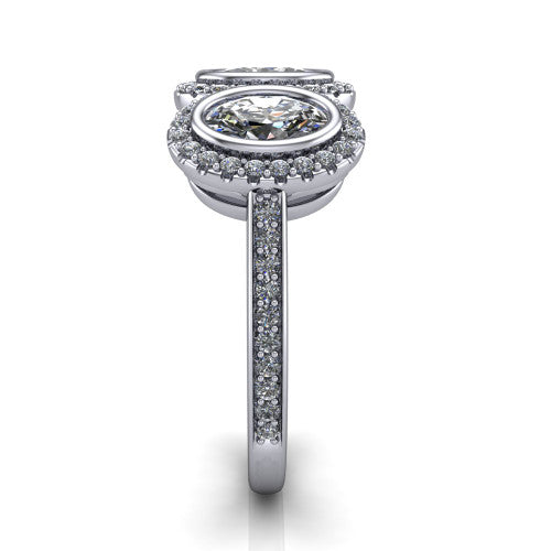 Aviana oval three stone halo engagement ring in 18K White Gold, side profile showing the pav&eacute; band, filigree scrollwork gallery, and three-stone halo in profile